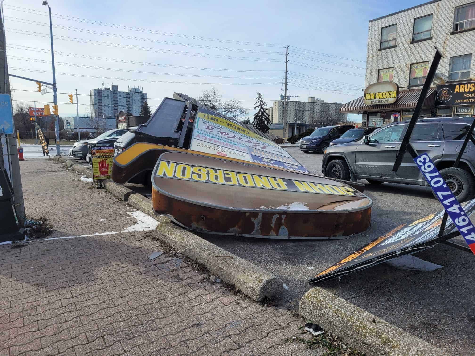 Iconic restaurant sign falls over and smashes cars in Mississauga