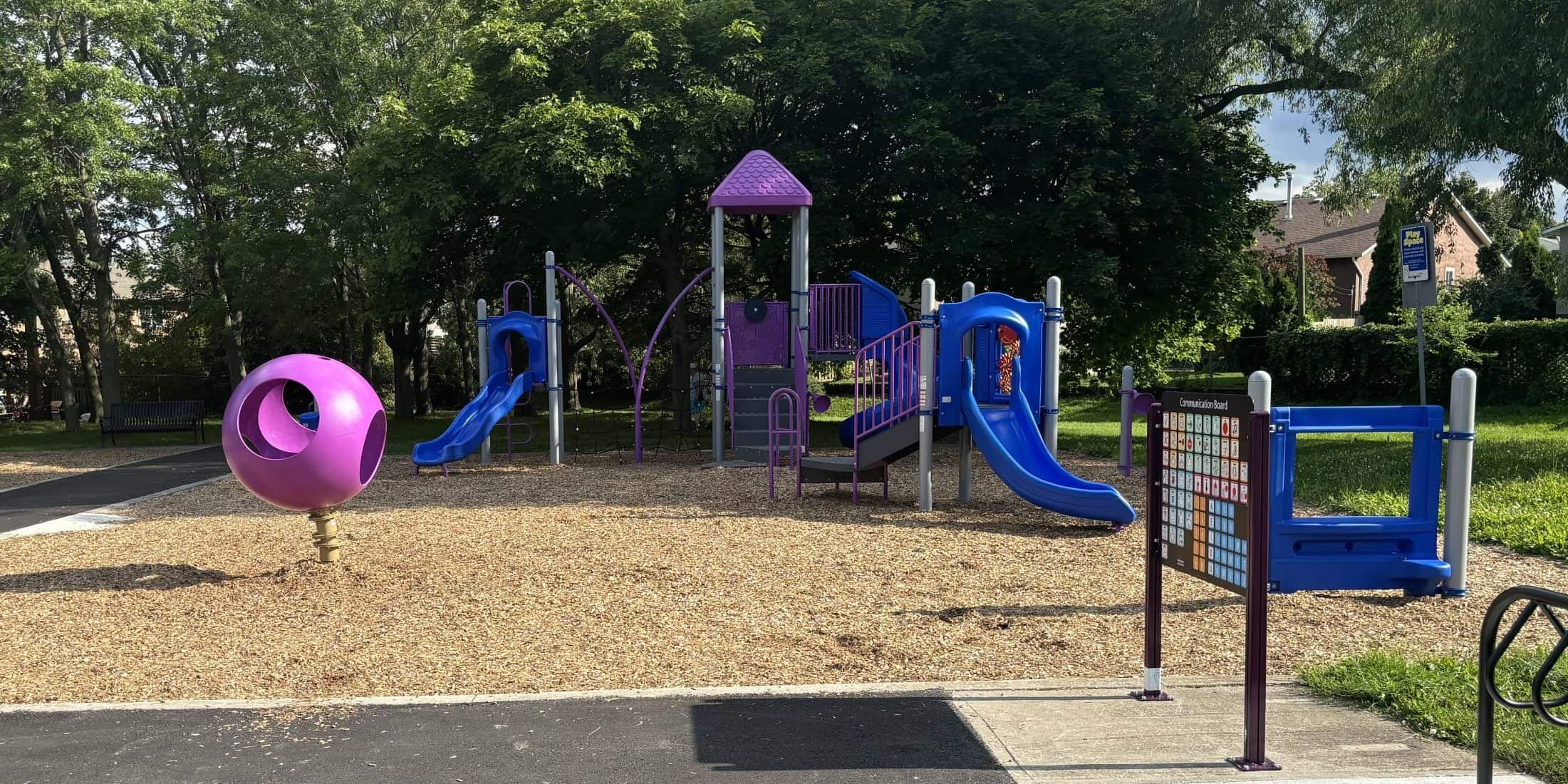 Burlington park reopens with new playground equipment, paved paths ...