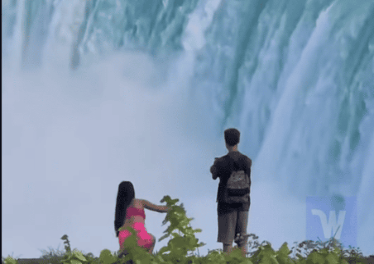 people standing too close to niagara falls