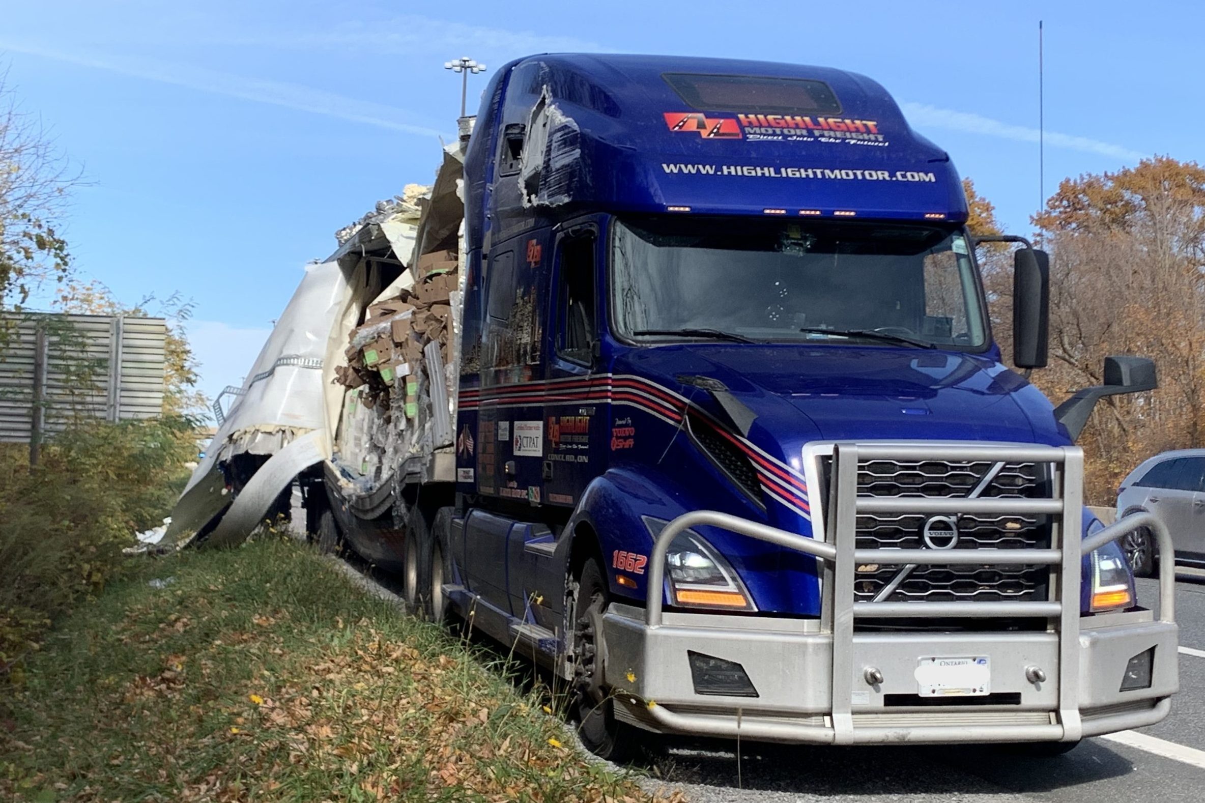 Impaired trucker hits overpass making mess of Ontario highway, police say